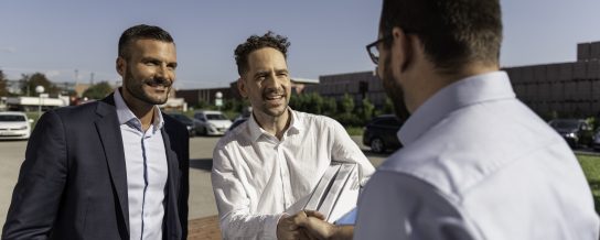 Project manager, architect and investor shaking hands, Fast Forward Commercial Excellence