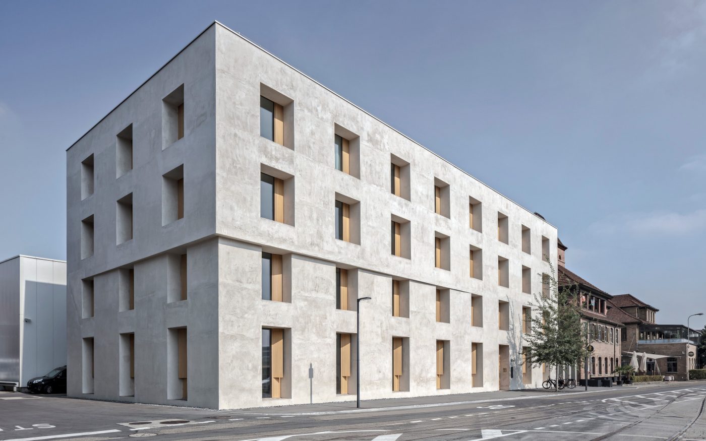 2232 Emmenweid. Brick Award 22 Category "Working together". Baumschlager Eberle Architekten. Photo of building