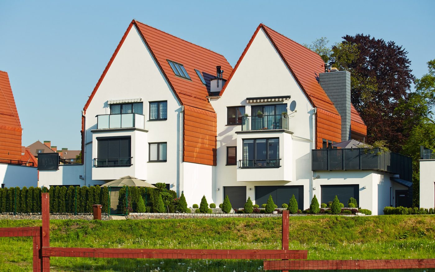 Family houses setting Raciborz Poland with Actua 10 red natural roof tile