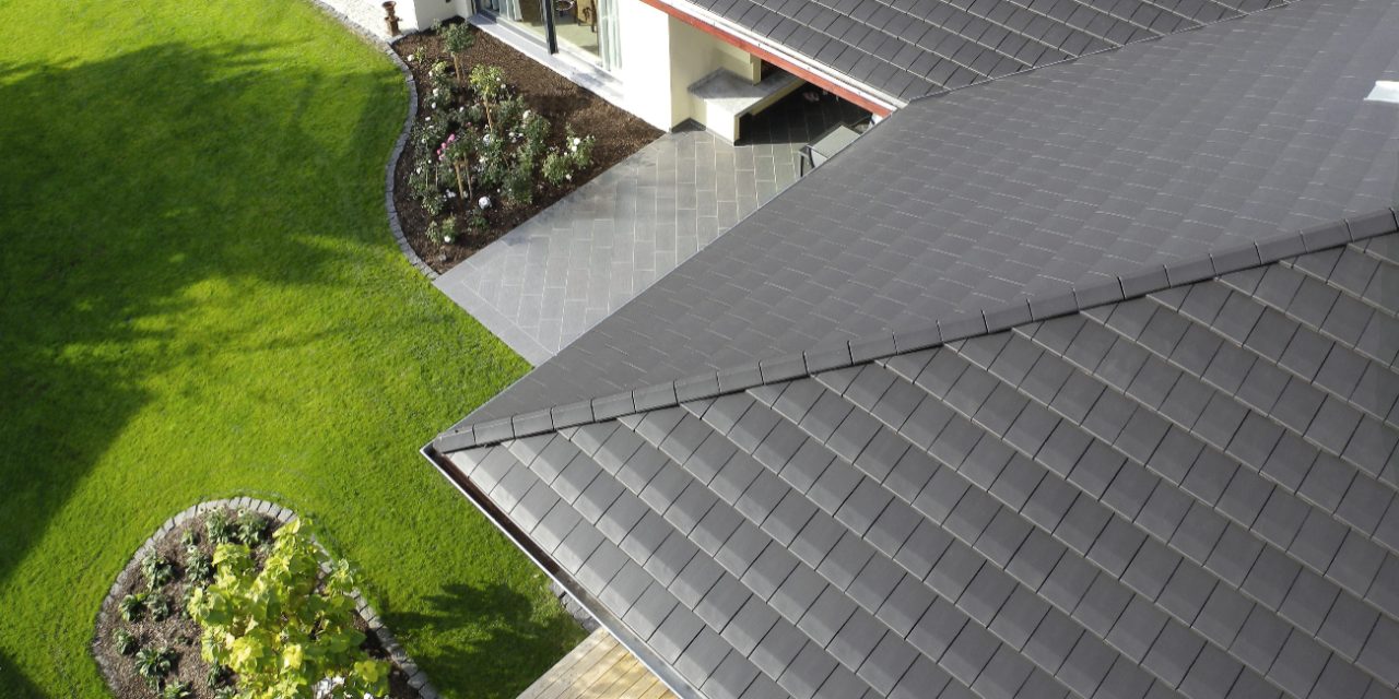 close up flat roof tiles noble graphite, aerial view