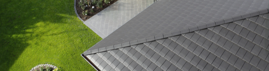 close up flat roof tiles noble graphite, aerial view