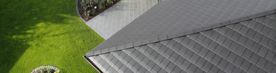 close up flat roof tiles noble graphite, aerial view