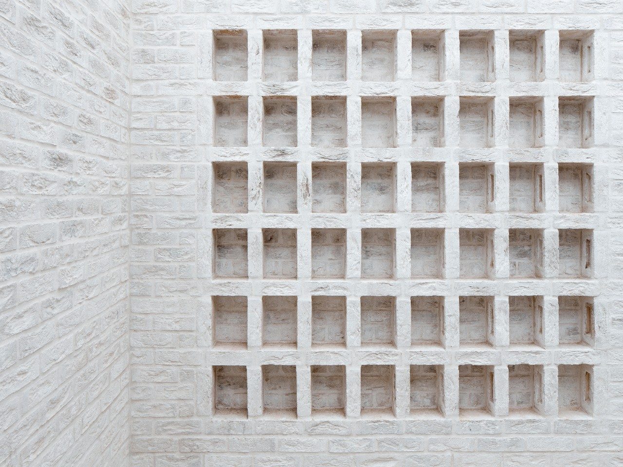 House built with Marziale and white flush mortar