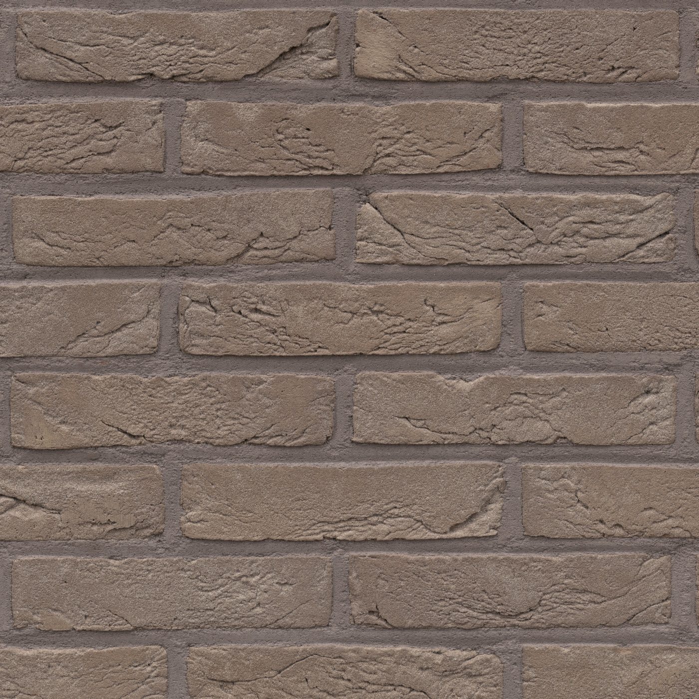 Tekstura cegieł i płytek klinkierowych Terca Plaza. Powierzchnia ręcznie formowana w jednolitym kolorze szaro-beżowym.